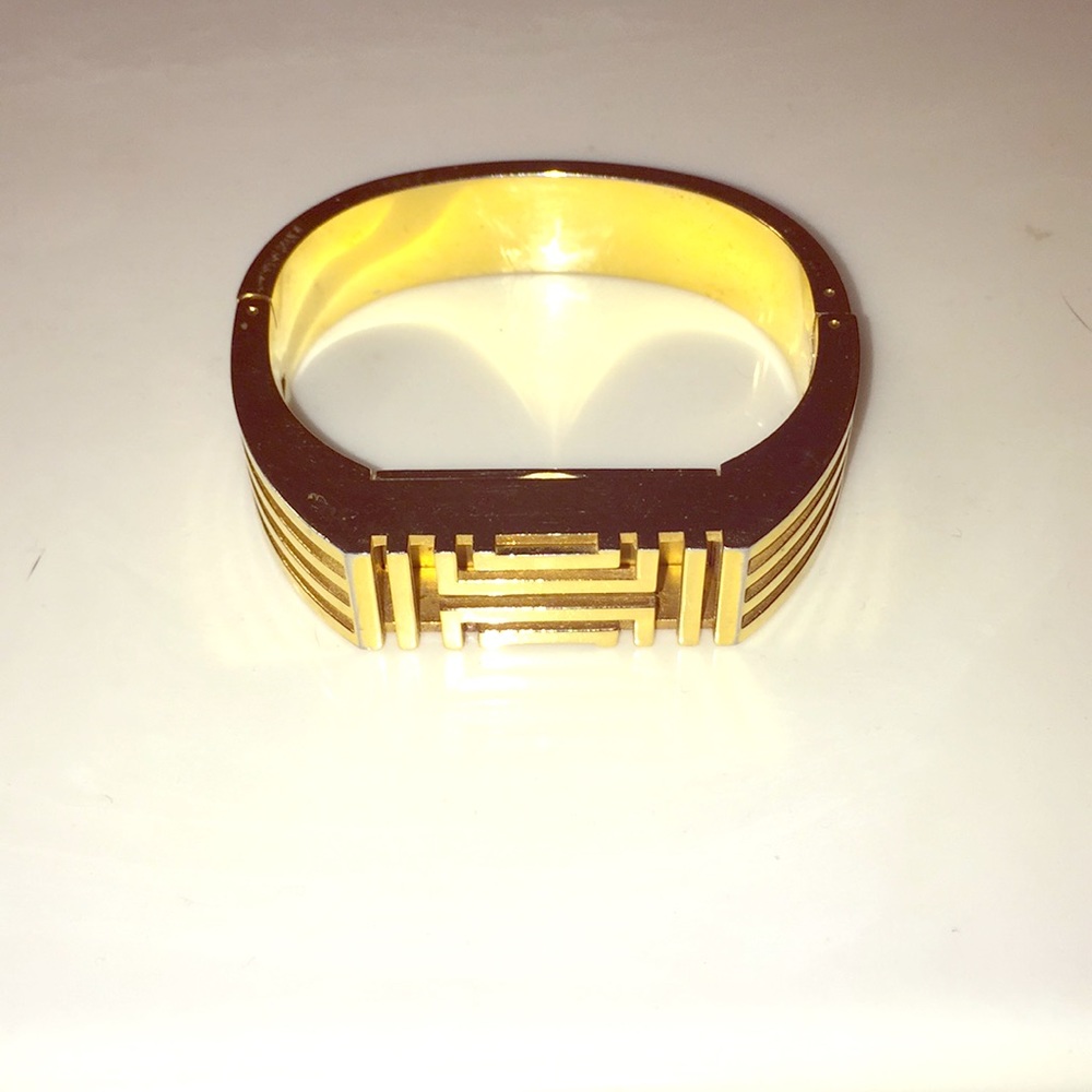 Tory Burch gold Fitbit cover